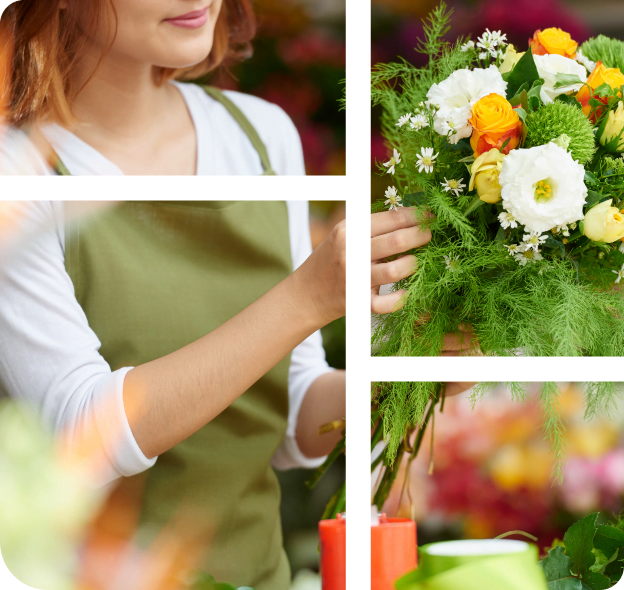 A female florist adjusts a bouquet with white and orange flowers and foliage.