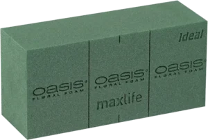 A green block of OASIS® Floral Foam MaxLife Ideal.